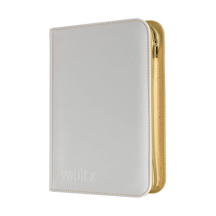 A Vault X zippered binder in white with gold stitching and zip, shown on a plain white background.