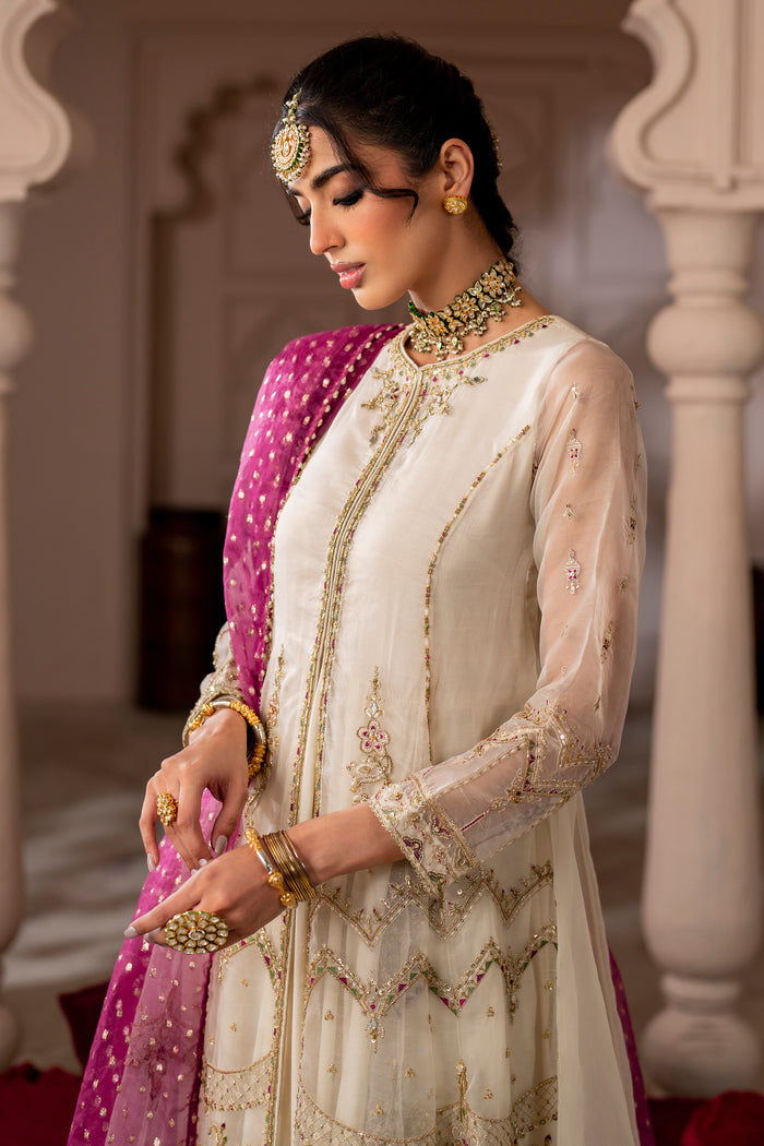 NAQSHI Abeeha outfit styled with magenta dupatta draped over shoulder, showing embroidery, sequin details, and contrast accents