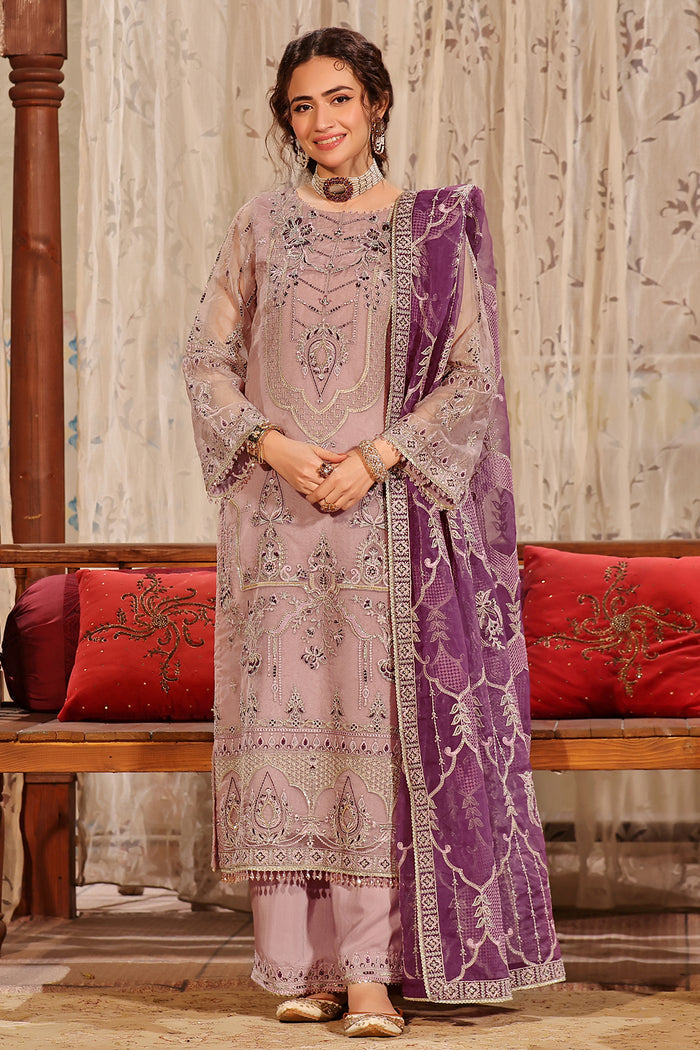 Full front view of NAQSHI Abeer outfit showing straight organza shirt, detailed embroidery, and purple dupatta styling