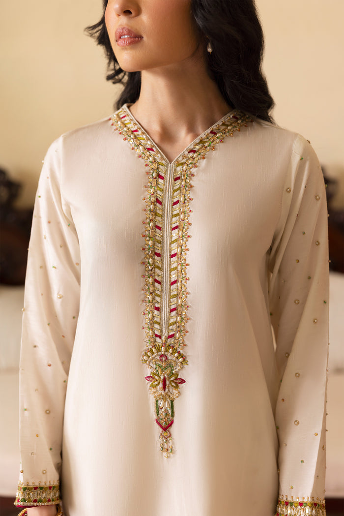 NAQSHI Abish culottes front view with multi-tone sequin motif spray on raw silk and embroidered border with threadwork complementing shirt detailing.