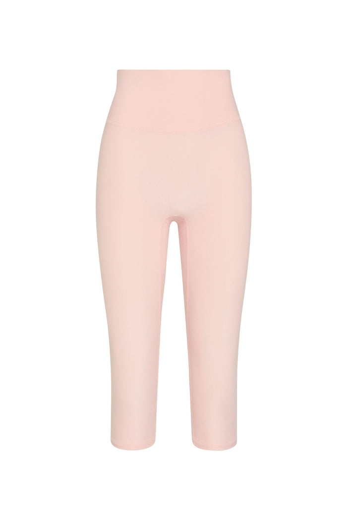 Front view of Acadia cropped legging in heather powder pink showing high waist, doubled waistband and cropped length on white background