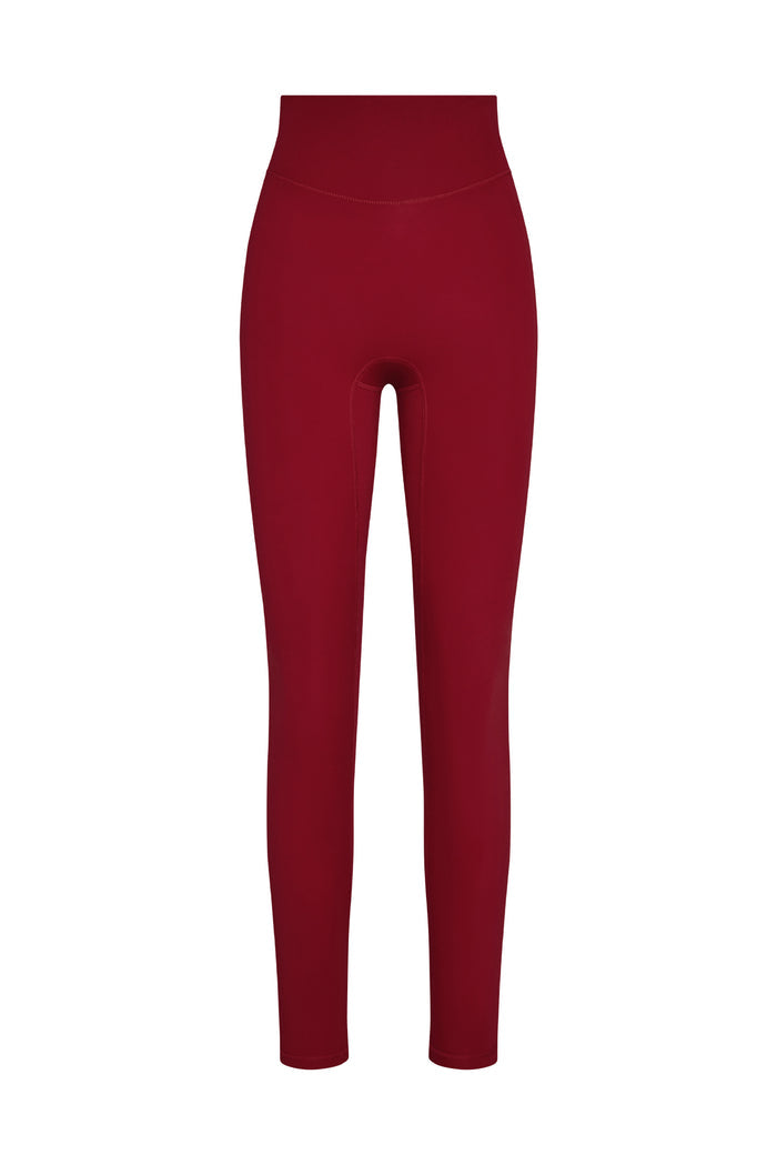 Front view of Acadia Legging in Cherry showcasing high rise doubled waistband and front seam on white background