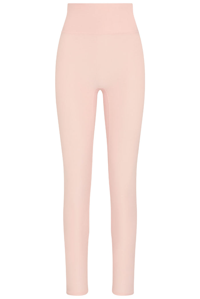 Front view of Acadia legging in Heather Powder Pink showing high waist, doubled waistband and front pocket on white