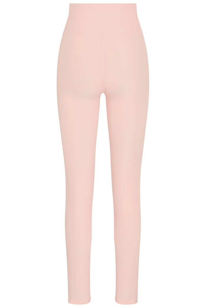 Back view of Acadia Legging in Heather Powder Pink showcasing high doubled waistband and center back seam on white background