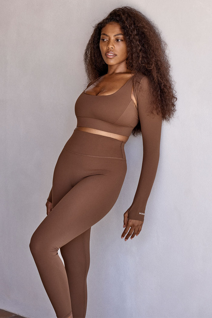 Three-quarter view of Acadia Legging 27-inch in Cliffside on model showing high-rise waistband and slim fit