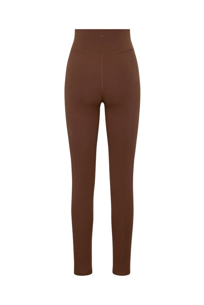 Back view of Acadia Legging 27 inch in Cliffside brown showing high-rise waistband and center seam on white background