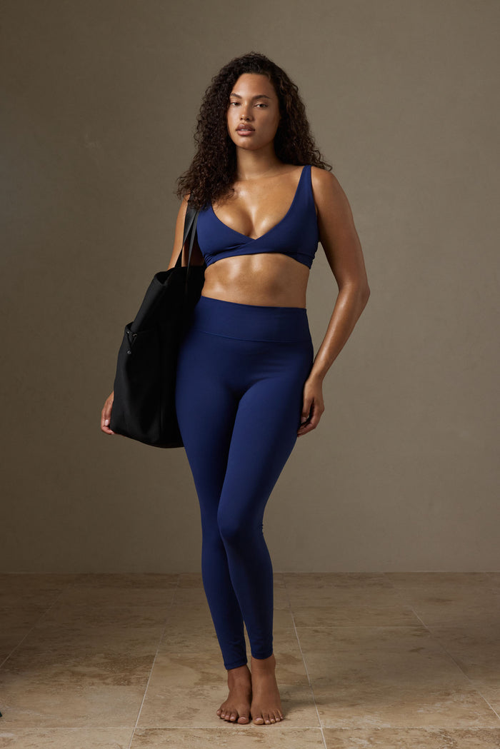 Full-length front view of Acadia Legging (Midnight Jersey) showing high waist, double waistband and front pocket on model