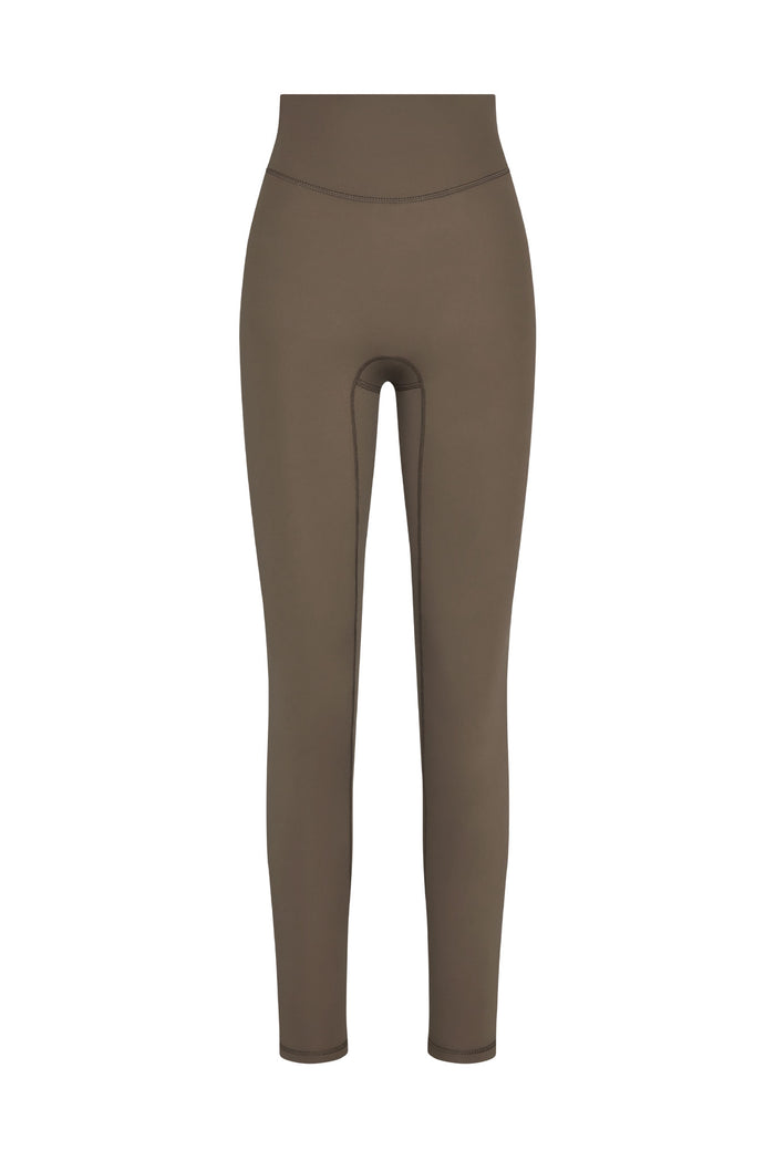 Front view of Acadia Legging in stone jersey showcasing high-rise waistband and slim full-length fit on white background