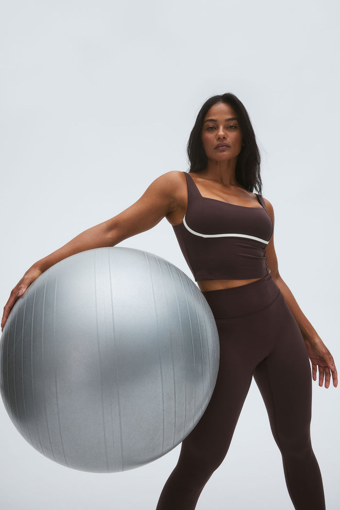 Front view of Acadia long legging 29 inch in Espresso showing high-rise contouring fit on model