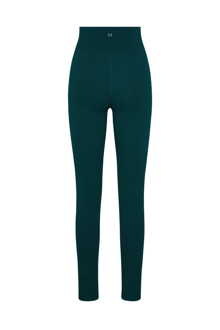 Front of Acadia Long Legging 29-inch in Evergreen, high waist, full-length, center seam, small M logo on white background