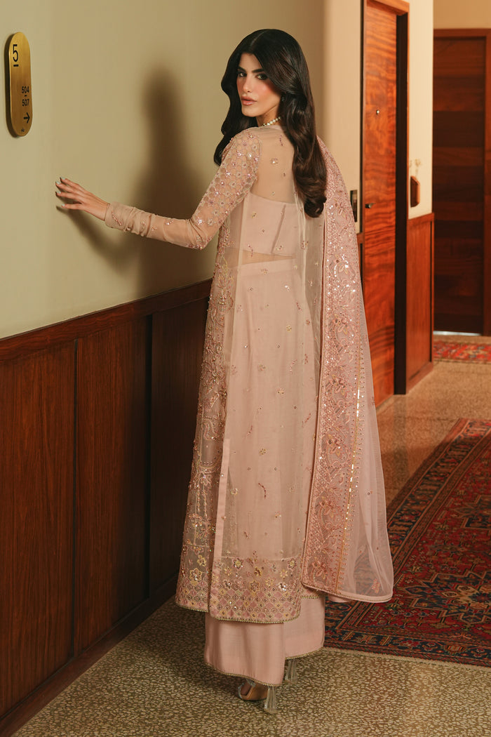 Side view of NAQSHI Adiva Lalic Dream outfit showing A-line long shirt, soft embroidery, straight culottes, and flowing net dupatta.
