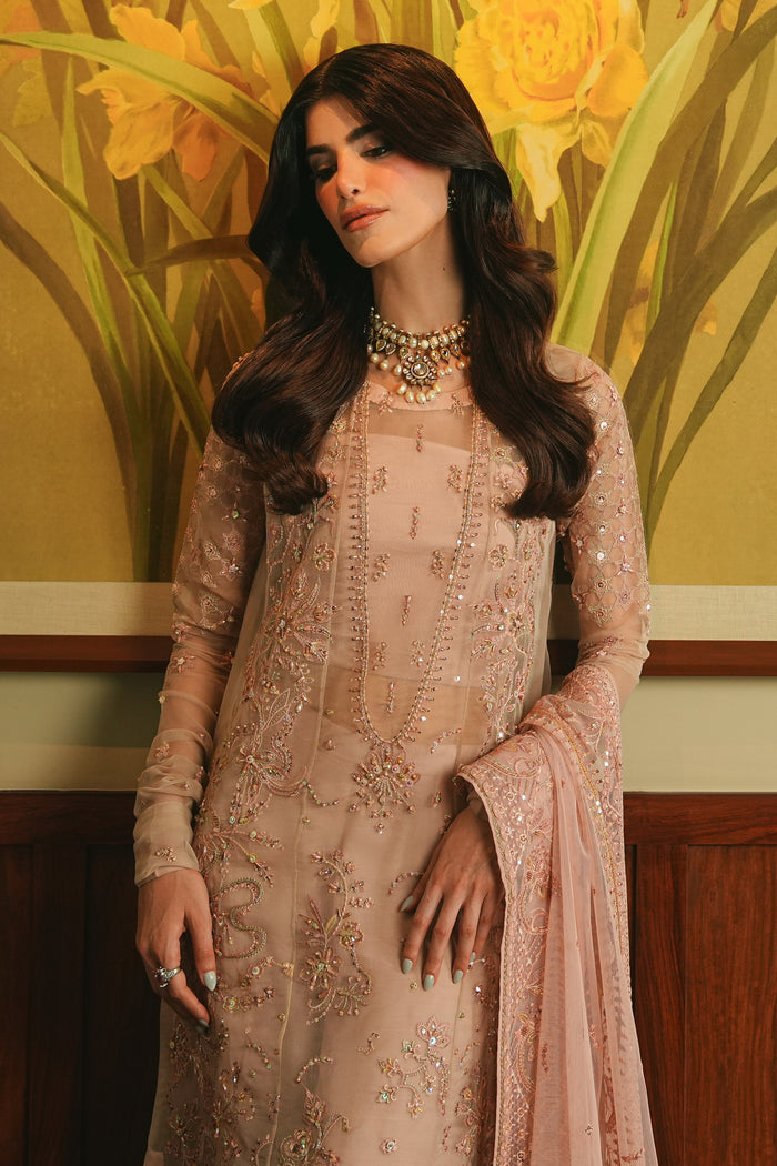 Full-length view of NAQSHI Adiva 4-piece ready-to-wear outfit showing organza shirt, PK raw silk culottes, and balanced formal styling.