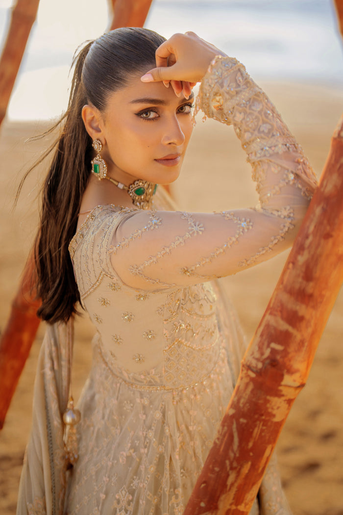 NAQSHI Alara net dupatta draped to showcase Mughal‑inspired floral motif spray, 4‑sided embroidered & sequin border finished with minimal lace.