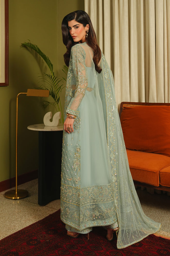 Side view of NAQSHI Alyana dusty blue outfit showing flowing open gown, fine embroidery, straight culottes, and soft net dupatta.