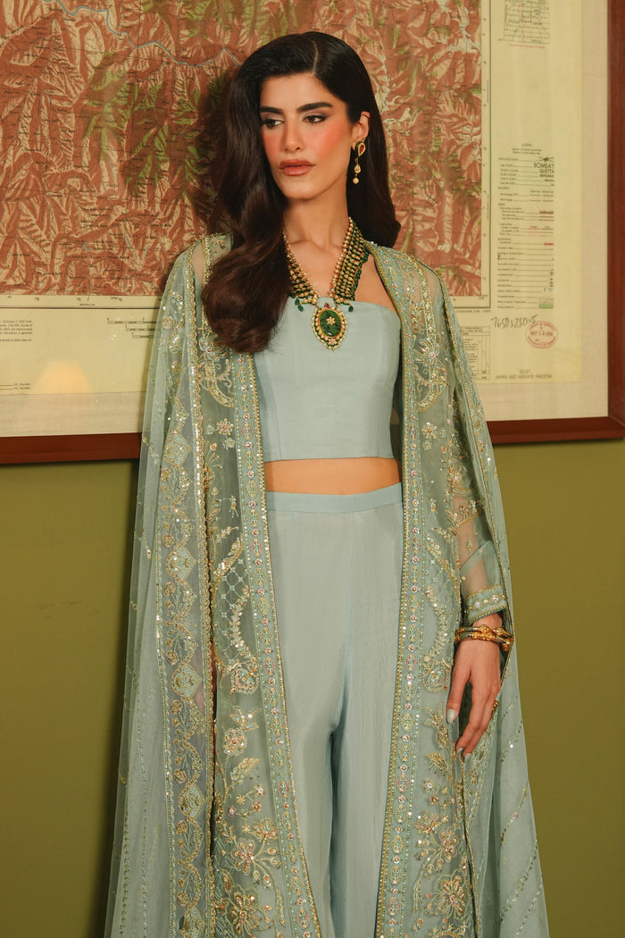 NAQSHI Alyana dusty blue formal outfit showing inner bustier, open-front gown, sequin embroidery, and clean modern silhouette.