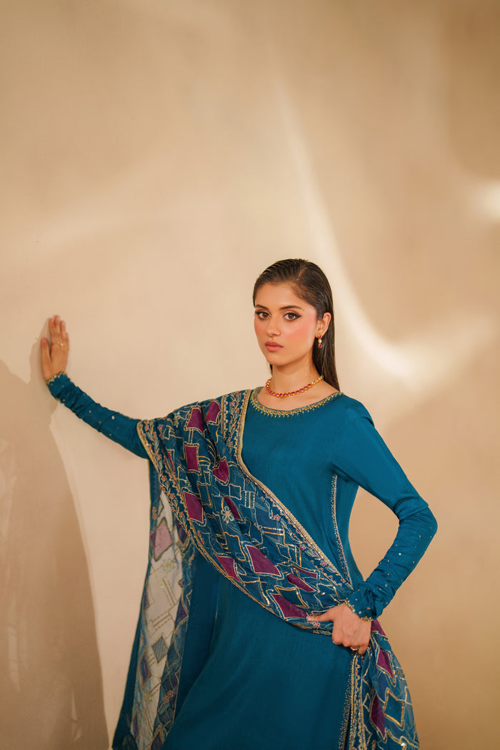 front view of NAQSHI Anaiza zinc luxury pret set with embroidered and sequin culottes and organza dupatta styled for weddings, parties and formal occasions