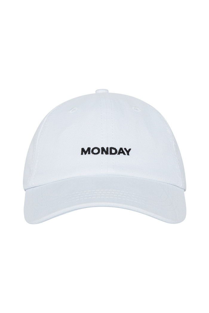 White baseball cap with centered embroidered text MONDAY on the front