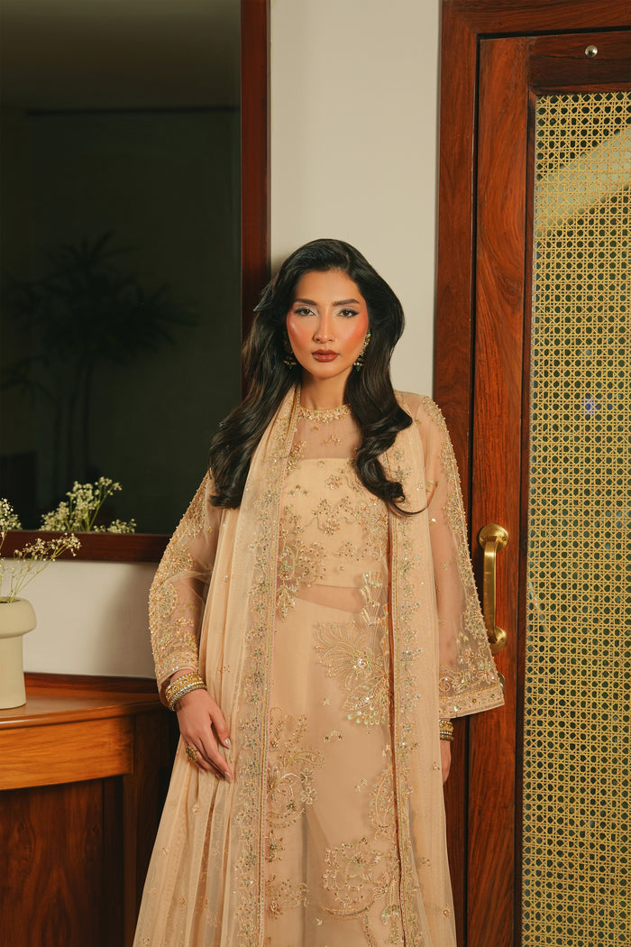Full-length view of NAQSHI Arish 4-piece ready-to-wear outfit showing long organza shirt, flared culottes, and balanced formal styling.