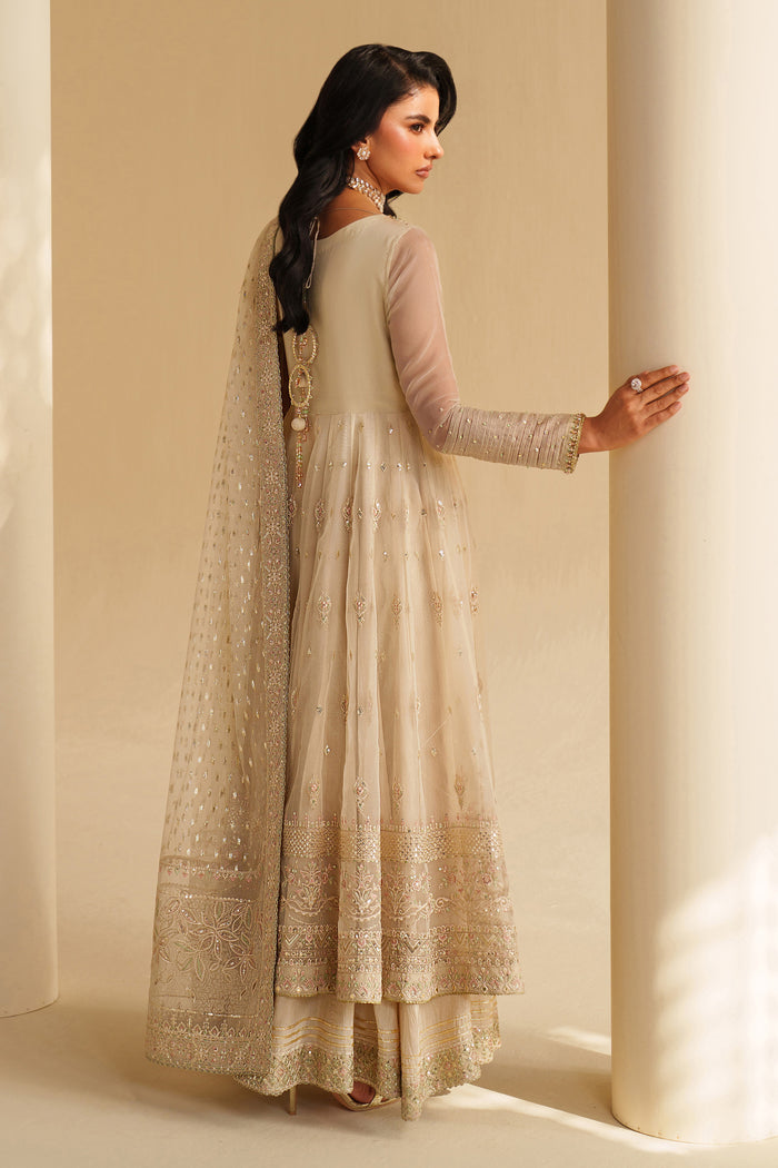 Angle view of Aroha off-white semi-formal dress showing sleeve, neckline, and embroidery details — premium occasion wear by NAQSHI