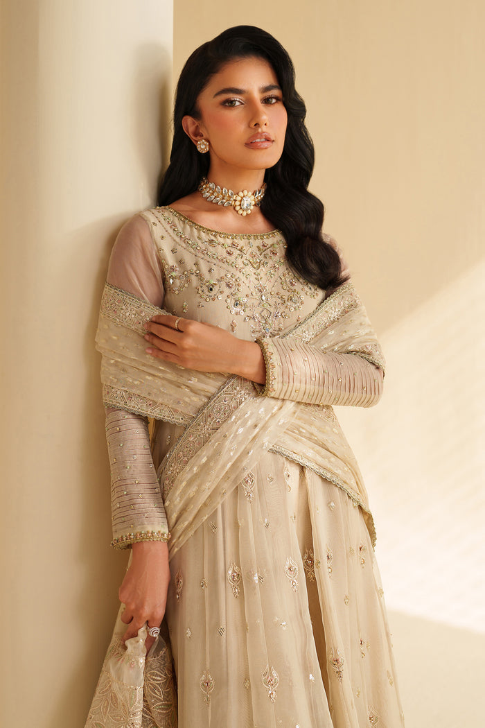 Styled model in NAQSHI Aroha off-white embroidered 3-piece set with organza dupatta — ideal for special celebrations and formal gatherings