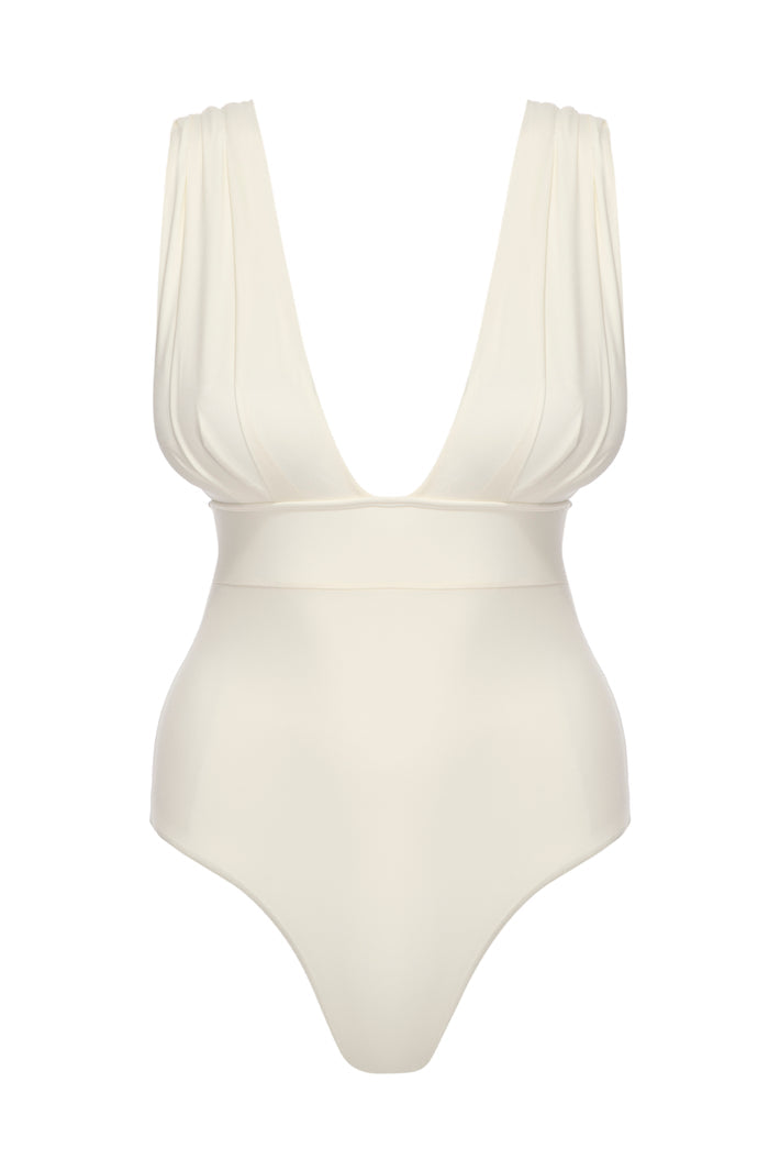 Front view of Aruba One Piece swimsuit showing deep V neckline, ruched wide straps and high-cut leg on white background