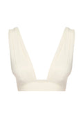 Front view of Aruba Top in ivory showing deep V plunge, pleated cups, and wide underbust band on white background
