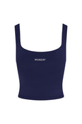 Front view of Aspen Tank in midnight jersey showcasing square neckline, fitted silhouette and MONDAY logo on white background