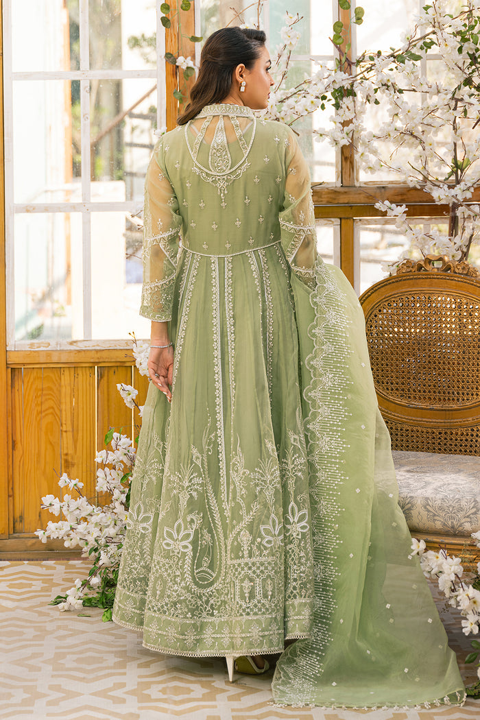 Back view of Ayla pistachio frock showing wide flare and detailed embroidery with soft dupatta fall, elegant ready made formal attire.