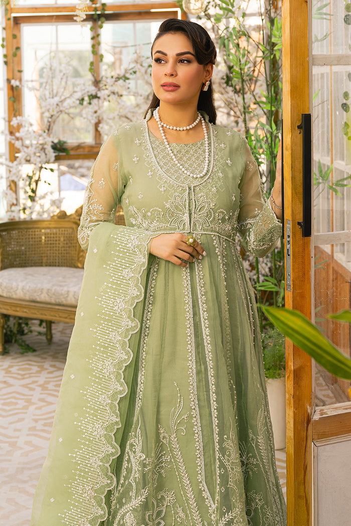 Side pose of Ayla ensemble showing graceful dupatta drape and light movement of frock, ready to wear celebration outfit.