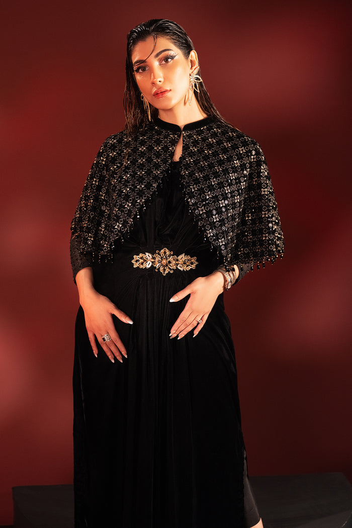 Front portrait of Ayna outfit focusing on neckline detailing and antique waist brooch, formal ready made evening dress.
