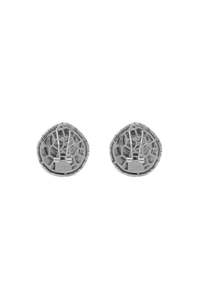 Pair of round silver clip-on earring backs with honeycomb-like textured backs and hinged metal clips