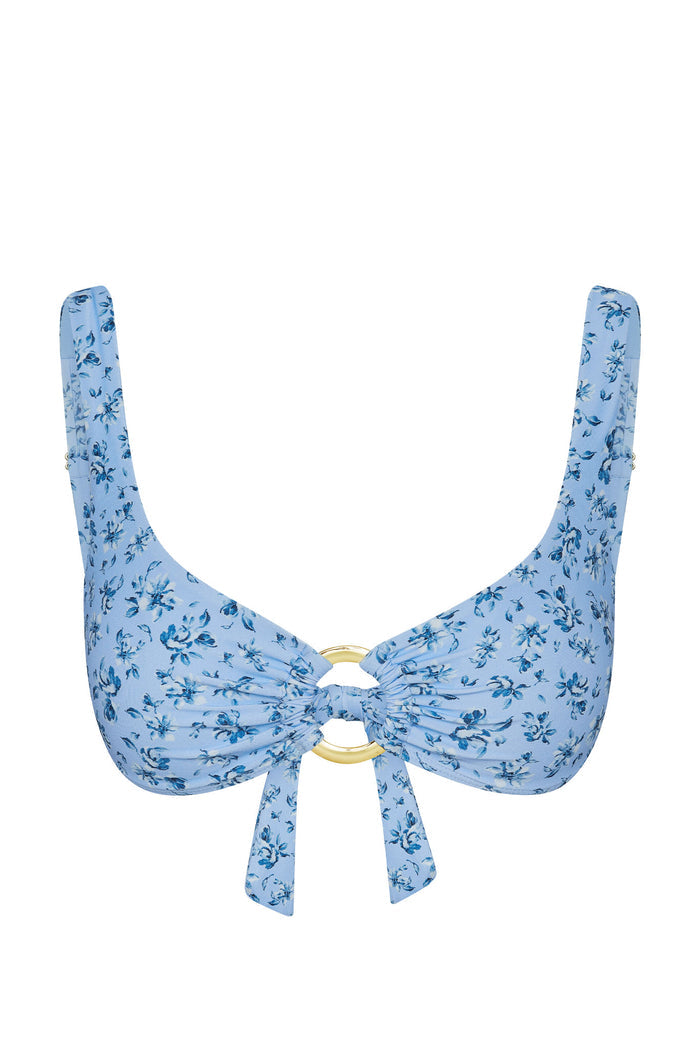 Front of Barbuda Top in Isola Floral with light blue floral, gold center ring and tie on white background