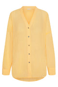 Front view of Barcelona Tunic in Honey Crinkle with V-neck, button-front, long sleeves and crinkle fabric on white