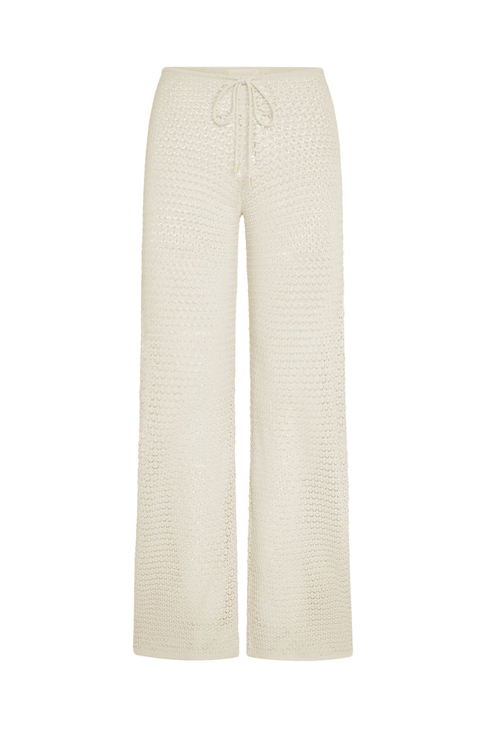 Front view of Belize knit pant in ivory lace crochet, wide-leg silhouette with drawstring waist on white background