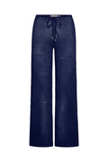 Front view of Belize Knit Pant in midnight showing open crochet knit, drawstring waist, and wide leg on white background