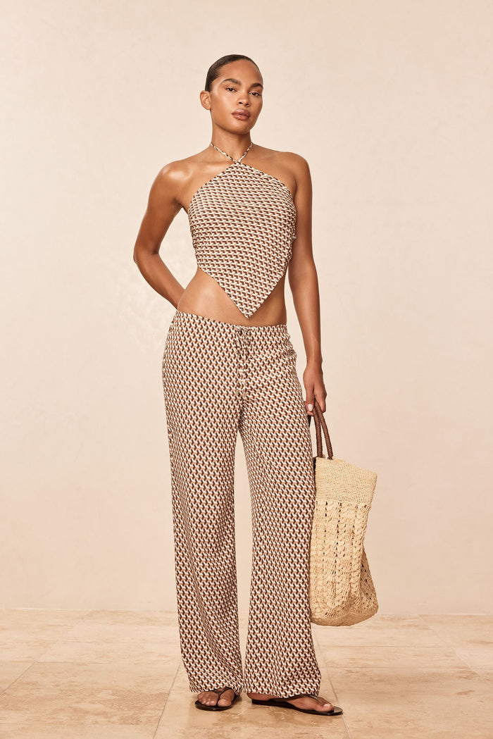 Front view of Belize Pant in Husk Geo Silk showing high-rise drawstring waist and wide-leg fit on model