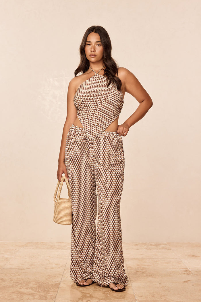 Front view of Belize Pant in Husk Geo Silk showing high rise cutout, adjustable drawstring waist and wide leg relaxed fit