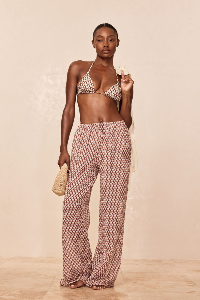 Front view of Belize Pant in Husk Geo pattern showing wide-leg fit and adjustable drawstring waist