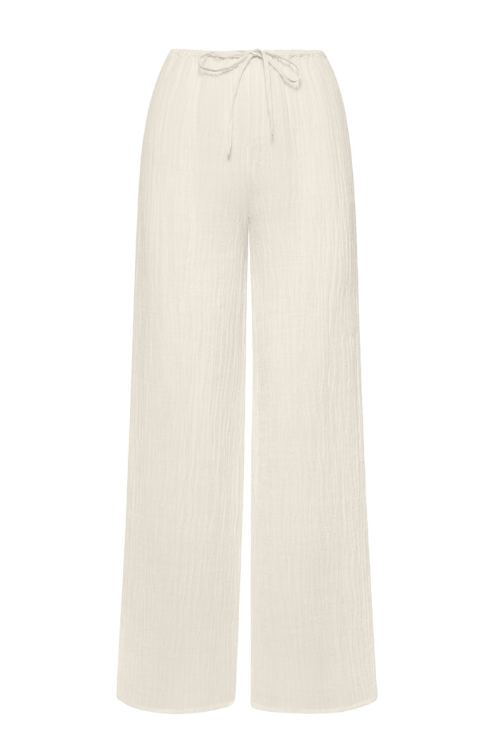 Front view of Belize Pant in ivory crinkle linen, wide-leg with drawstring waist and full-length relaxed fit