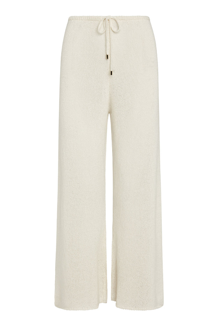 Front view of Belize Pant Open Knit in ivory showcasing open-knit wide-leg silhouette and drawstring waist with metal-tipped cords on white background