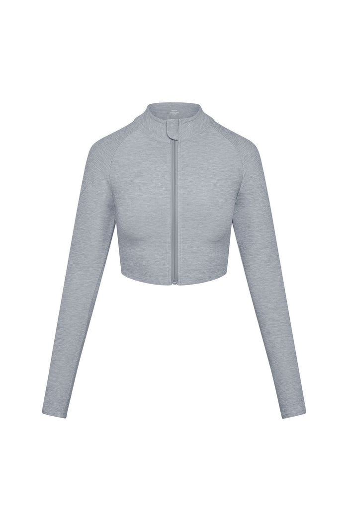 Light heather-gray cropped long-sleeve jacket with front zipper and stand collar.