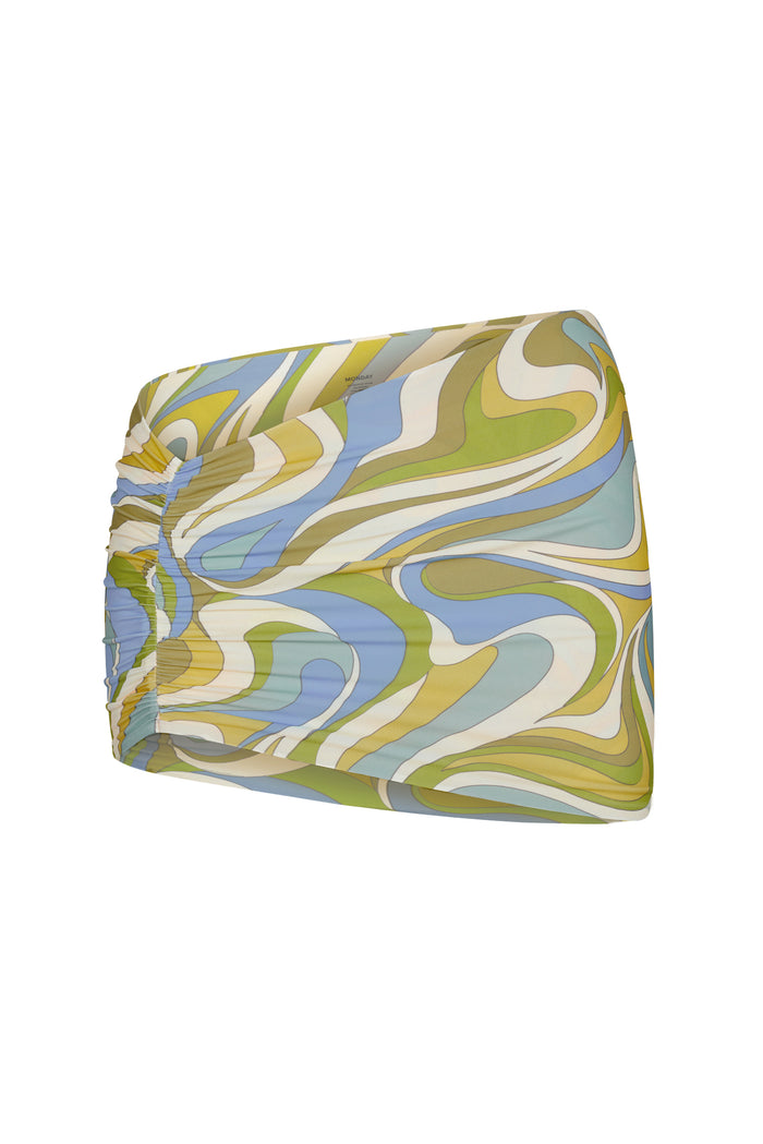Front view of Bimini Skirt in Costa Rei Apple showcasing side ruched mini with retro swirl print on white background