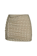 Front view of Bimini skirt in Tile Geo showing side ruched detail and brown-and-cream geometric tile print on white background