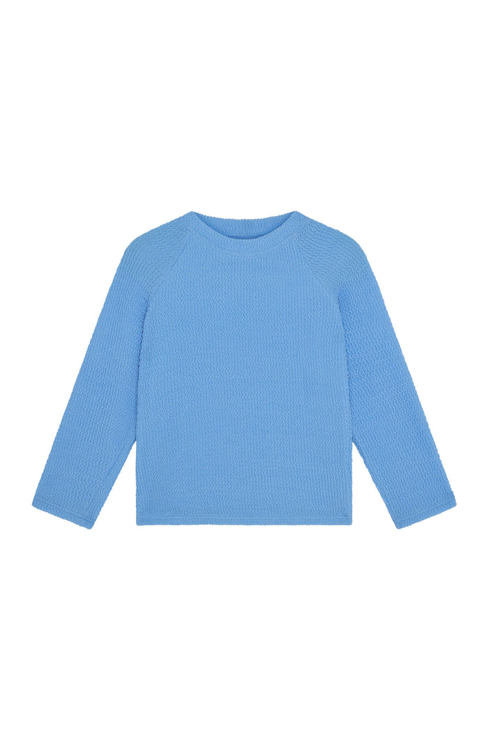 Front view of Bondi kids rashguard in Azure Crinkle showing long sleeves, crinkle texture, and crew neckline on white background