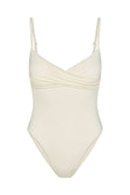 Ivory one-piece swimsuit with ruched crossover bust, adjustable thin shoulder straps, high-cut leg openings.