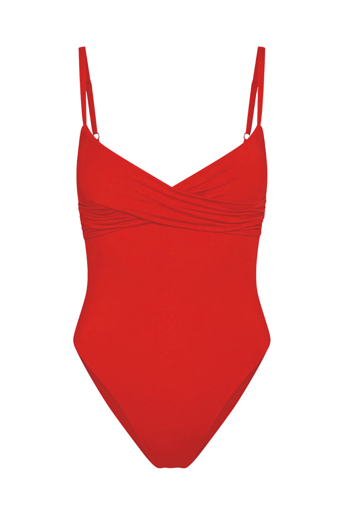 Front view of Bordeaux One Piece in Chili Pepper showing crossover neckline, adjustable thin shoulder straps, and high-cut leg on white background