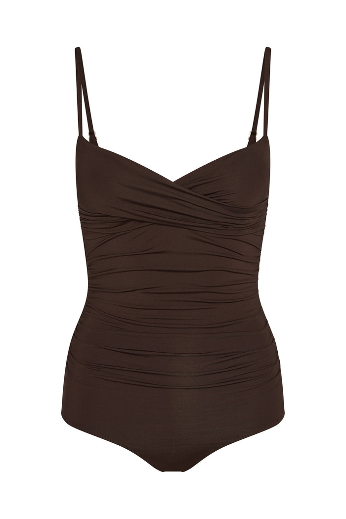Front of Bordeaux one-piece swimsuit in Espresso with crossover neckline, adjustable thin straps, and ruched torso on white background