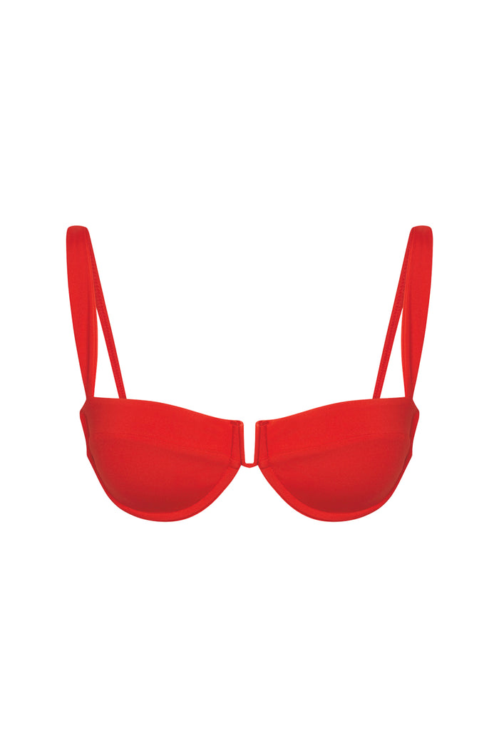 Front view of Cala Roja Top in Chili Pepper showing underwire cups with U wire center and shoulder straps on white