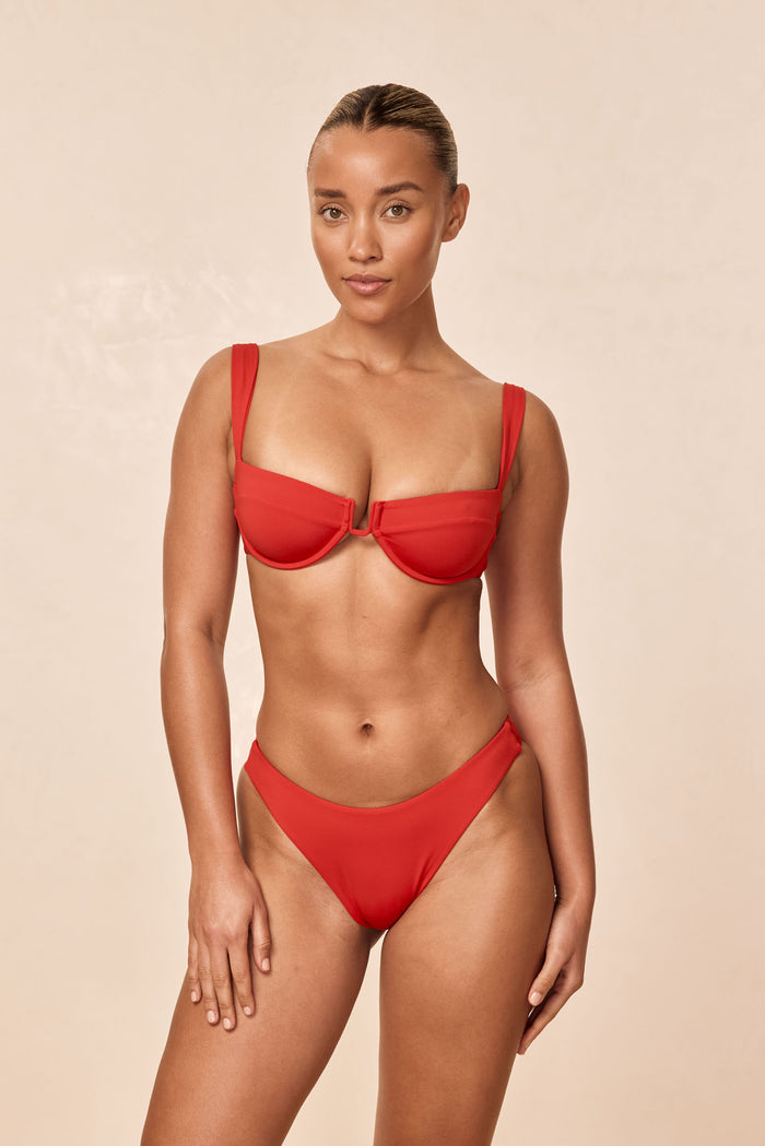 Front view of Cala Roja Top in Chili Pepper showing underwire balconette and U shaped center wire on model