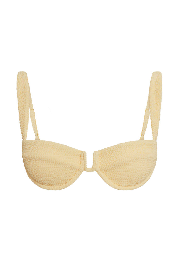 Front view of Cala Roja top in raffia crinkle showing smocked texture, V plunge underwire cups and adjustable straps on white